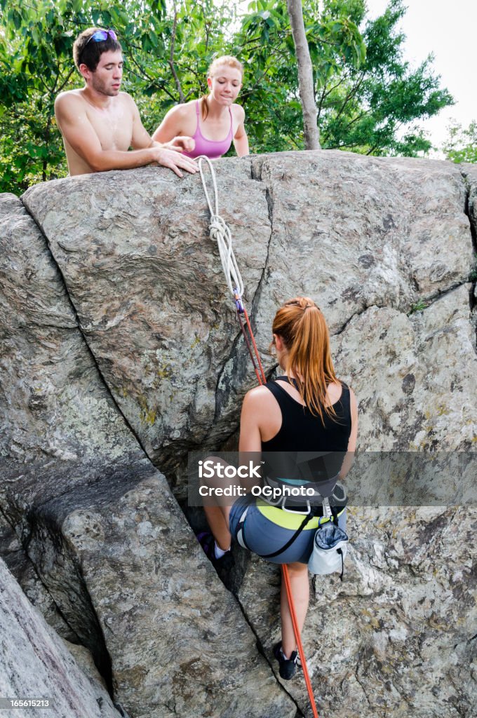 Friends out rock climbing Vertical Stock Photo