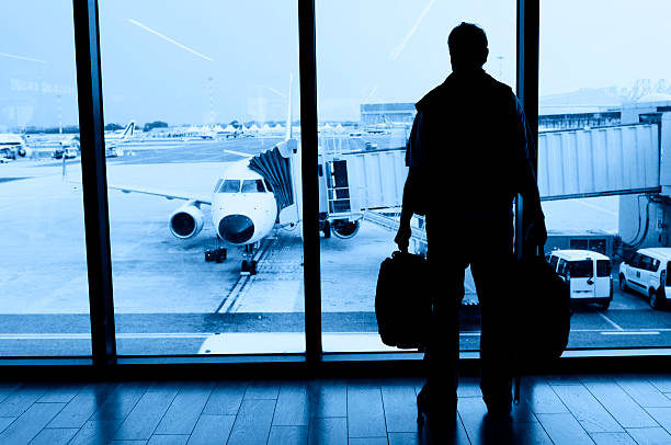 istock Man Waiting for Flight in Airport Lounge 165615576