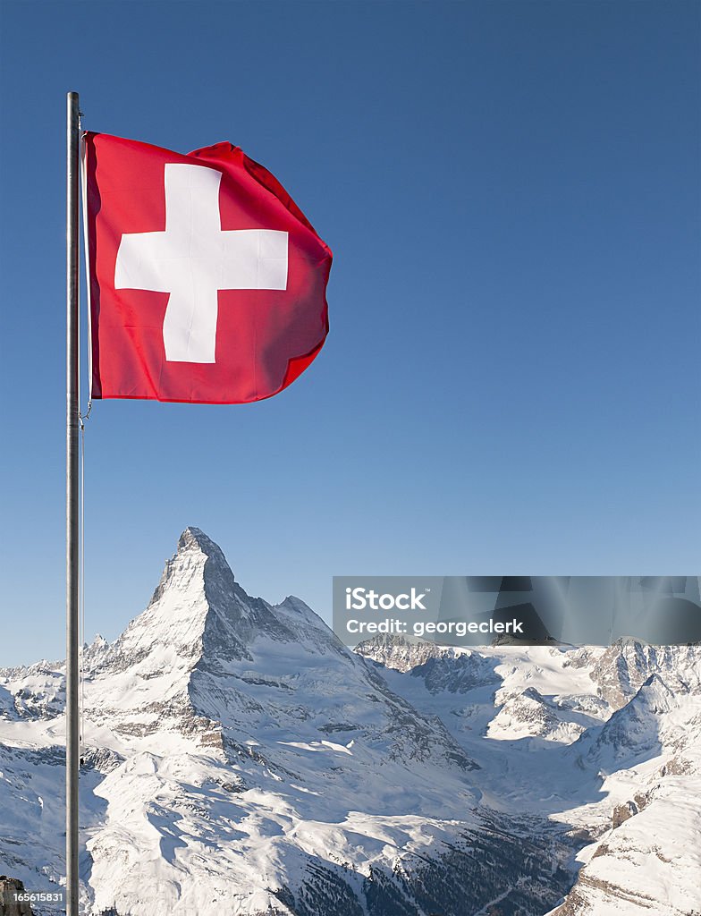 スイス国旗、マッターホルン - スイス国旗のロイヤリティフリーストックフォト