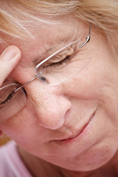 istock Mature woman with headache 165619355