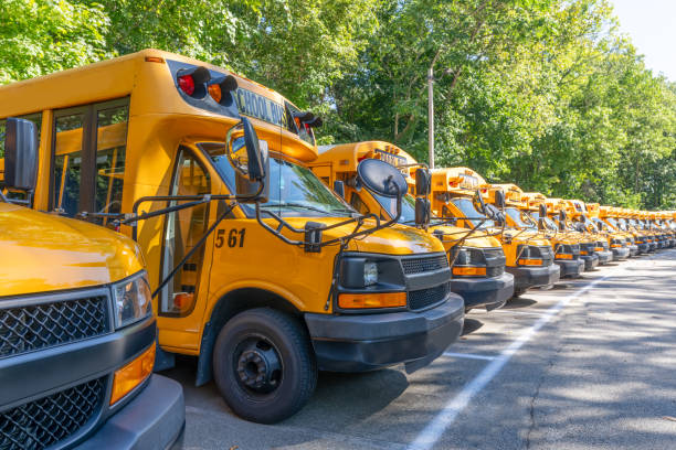 istock Front of a parked yellow school bus. 1656205521