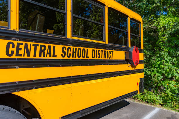 istock Side of a parked yellow school bus 1656224580