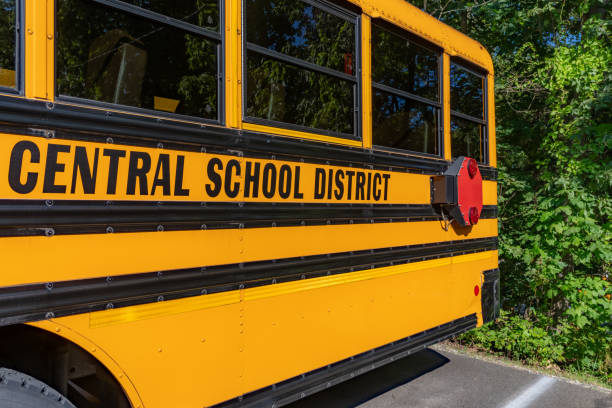 istock Side of a parked yellow school bus 1656226742