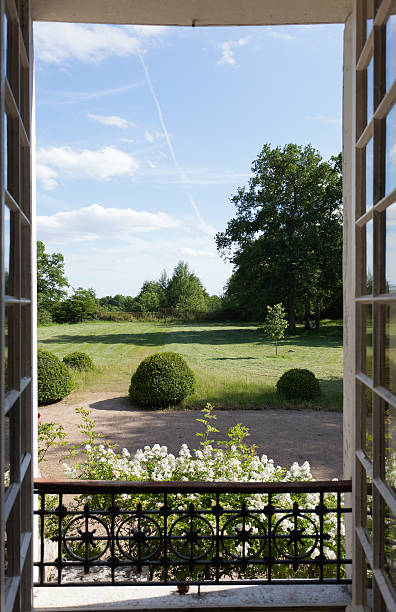 Room with a View Room with a view arranged with a artfully green garden. house railing stock pictures, royalty-free photos & images