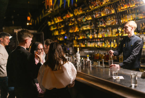 istock Guest drink and talk and bartender takes orders in bar 1656266476