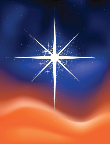 Glowing Christmas star with orange, blue and black colored background.