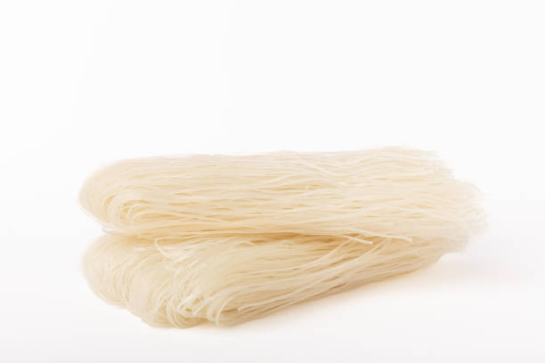 istock Dried raw rice noodles isolated on white background. 1656366963