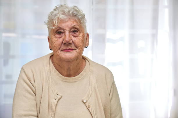 istock Old woman sitting on a clinic 1656382808