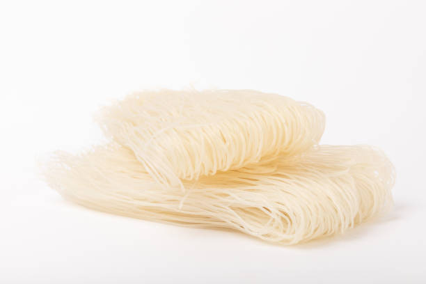 istock Dried raw rice noodles isolated on white background. 1656406158