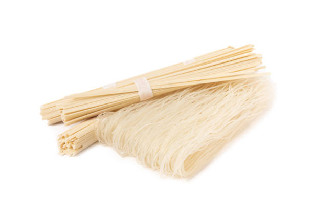 istock Dried raw rice noodles isolated on white background. 1656443289
