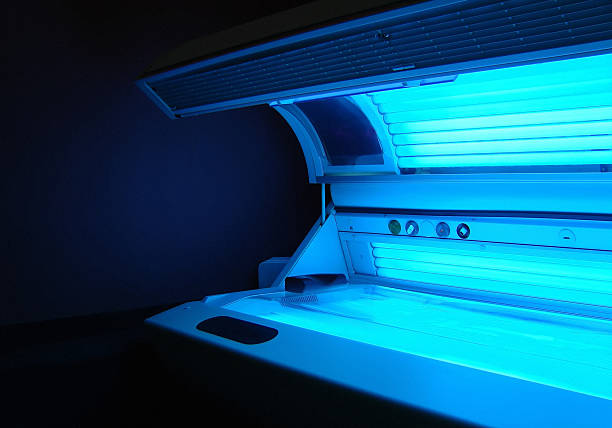 solarium Opened running tanning bed with face tanner... lepro stock pictures, royalty-free photos & images