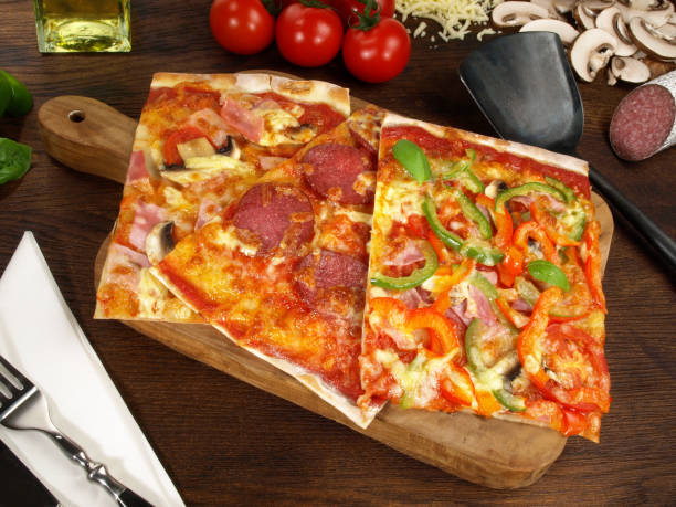 istock Pizza Pieces from a Metal Tray 1656468366