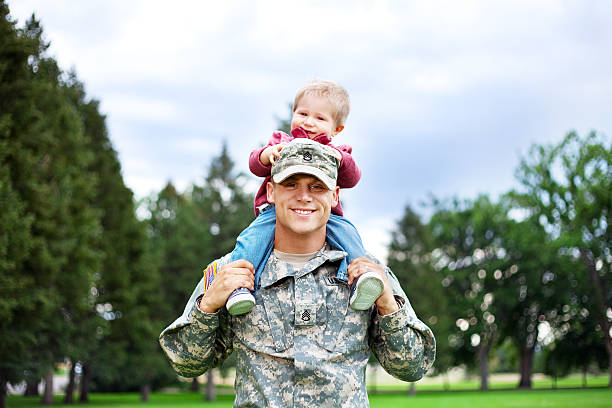 istock Army Family Series: Real American Soldier With Son 165647030