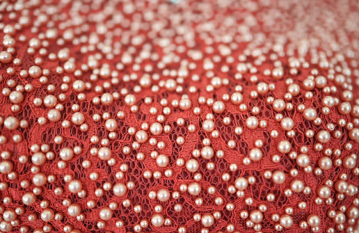 Red Fabric pattern with pearl jewelry pattern