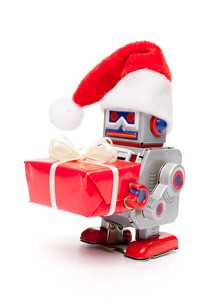istock Retro tin toy santa robot holding christmas present 165652411
