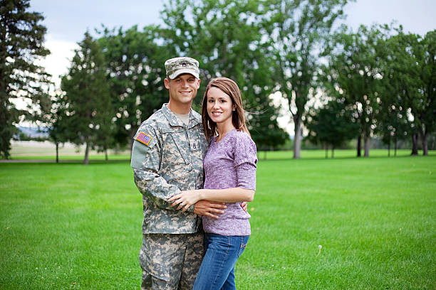 istock Army Family Series: Real American Soldier With Wife 165653099