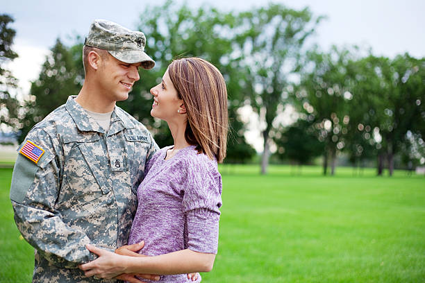 istock Army Family Series: Young US Soldier with Wife 165653106