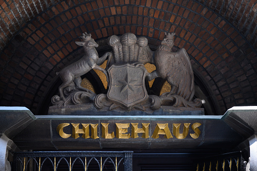 Hamburg, Germany - June 17 2023: House of Chile or Chilehaus Entrance with Lettering and Exotic Animal Figures
