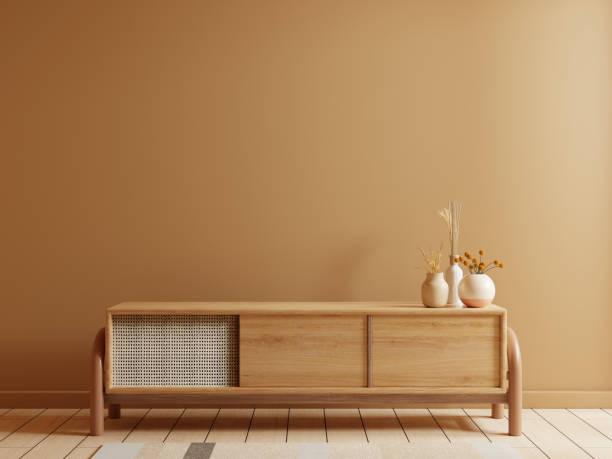 istock Minimal cabinet for tv interior dark brown wall mockup. 1656547025