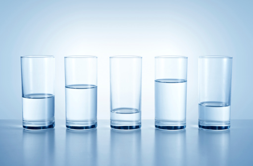 Different levels of water glasses, water shortages in different regions symbolizes.