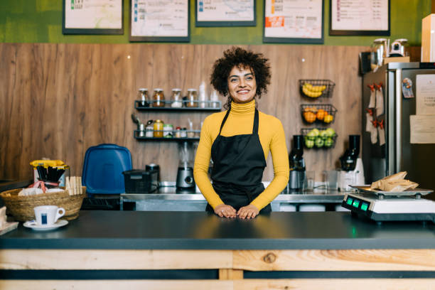 istock Woman working in small coffee shop 1656560500
