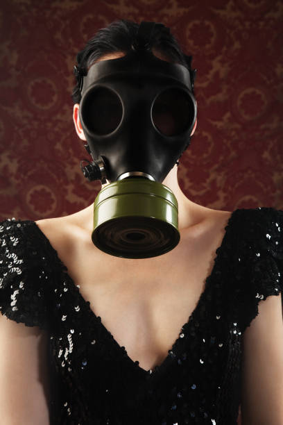 istock Woman with a Gas Mask 165656261