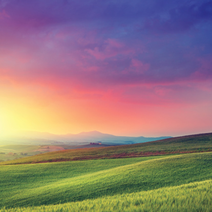Dawn above the Tuscan hills and wheat-fields. Really vivid colors for the mood :) 