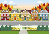 istock Colorful illustration of a row of houses, road, and trees 165658836