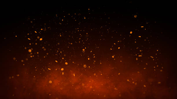istock 3D Burning embers glowing. Fire Glowing Particles on Black Background 1656615485