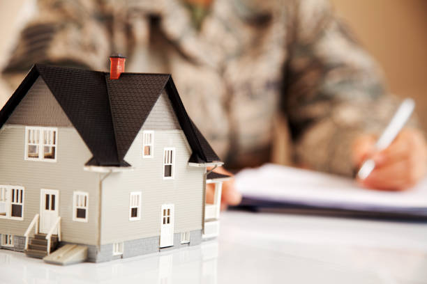 istock Air Force Uniformed Personel with Real Estate Paperwork 165661675
