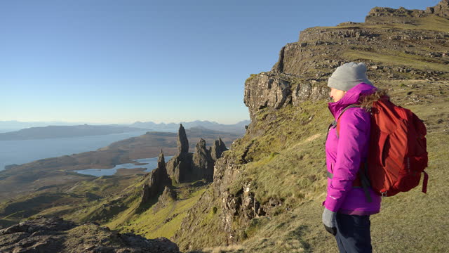 Video of a woman hiking to see the Old man of Storr.