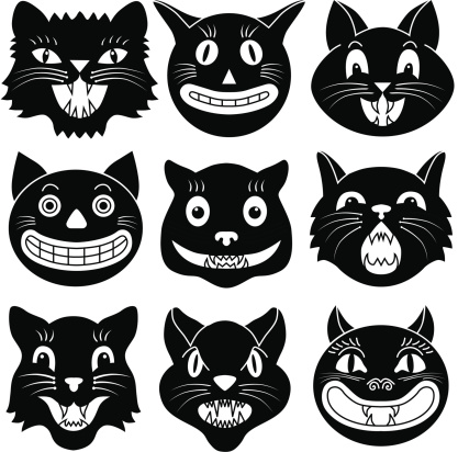 Vector illustrations of Halloween cat heads.