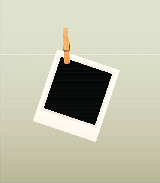 Photograph hanging on a line Photograph hanging on a line. CMYK. photos hanging string stock illustrations