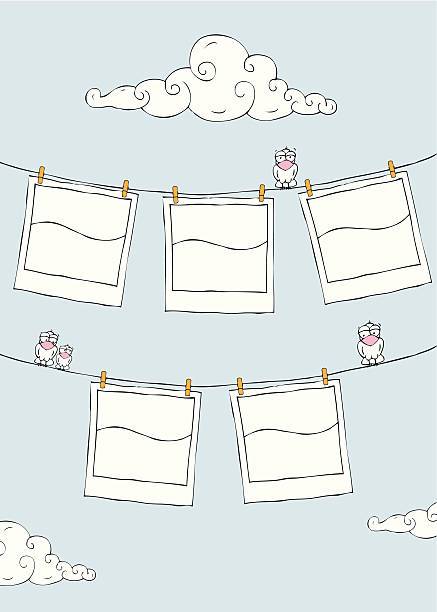 A cartoon drawing of film pictures on a clothes line  Hanged blank polaroids  by clothespin  as sketch. this editable vector file contains eps8, aics3, ai10 and 300dpi jpeg formats. pencil drawing photos stock illustrations