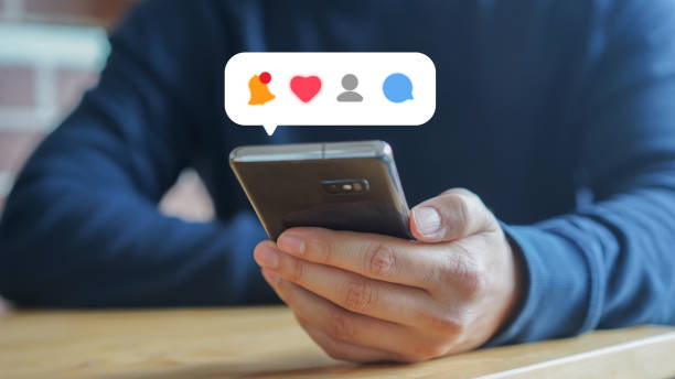 istock close up man hand hold smartphone and check notification on social media application with virtual icon for technology and modern lifestyle concept 1656749131