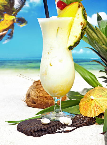 istock Pina Colada - Coconut Cocktail on tropical Background 1656820076