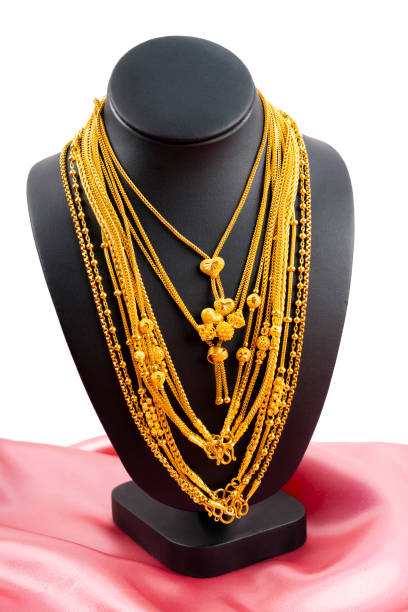 istock The Gold necklaces on necklace display stand. 1656828600