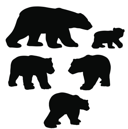 Polar bear silhouettes with cub.
