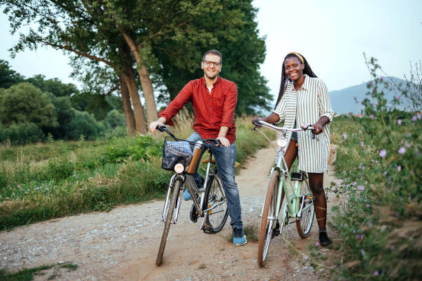 istock Loving couple riding bicycles 1656867989