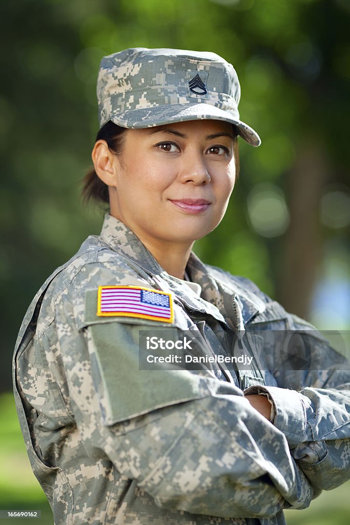 Female American Soldier Series: Outdoor Portrait Portrait of a female US soldier in Army Combat Uniform, Universal Camouflage Pattern or ACU smiling. THIS IMAGE IS ONLY AVAILABLE HERE AT ISTOCKPHOTO. Veteran Stock Photo