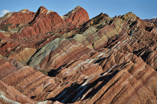 The picture showed Zhangye National GeoPark at dusk. And the Danxia landform landscape was beautiful and colorful. If you were going to travel in Gansu, the northwestern of China, you should see the Danxia landform of Zhangye.