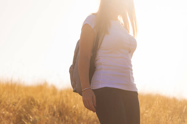 portrait of a young woman at sunset