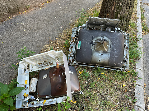 Old broken televisions on the street