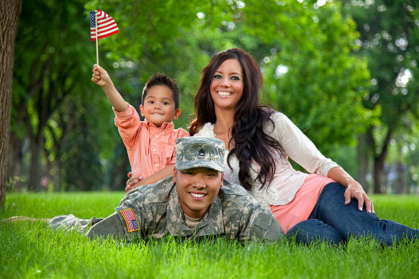 istock Army Family Series: Young US Soldier with Wife & Son 165694170
