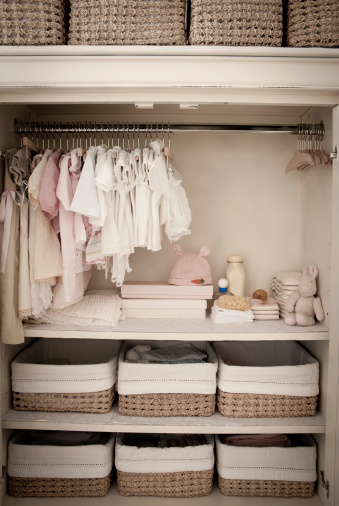 Baby clothing in the nursery, close up