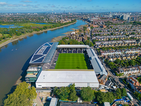 Fulham, London. United Kingdom. Aerial image of Craven Cottage Stadium. Fulham Football Club. Along the River Thames. 15th August 2023