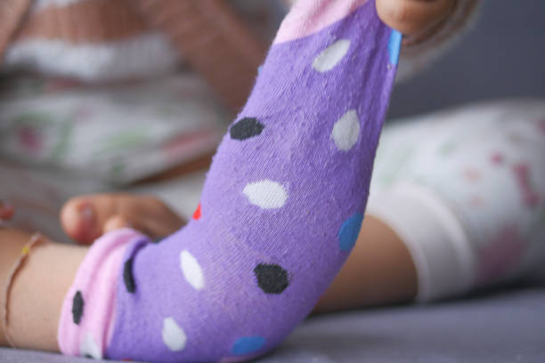 istock a colorful soft socks on child feet . 1656960558