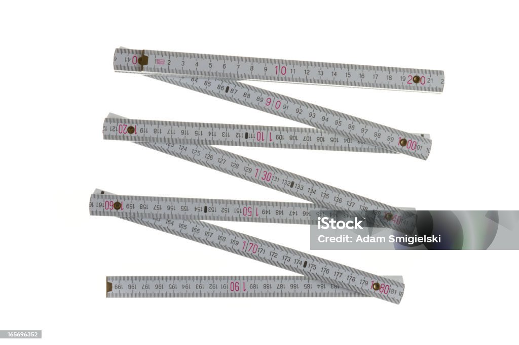 white folding ruler folding ruller isolated on white Folding Ruler Stock Photo