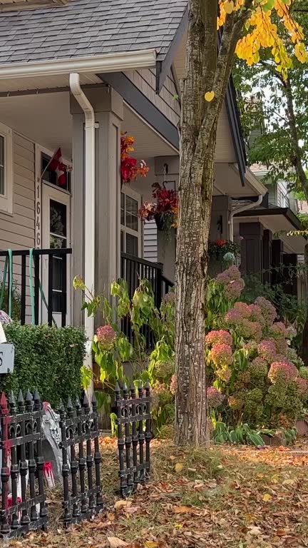 Trick or Treat Halloween decorations at home Witches hung on the porch Introducing Skeletons, Bones America brightly celebrate Halloween house is ready to receive children to give them sweets