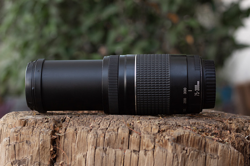 full body of a telephoto lens for nature photography captured in a nature environment